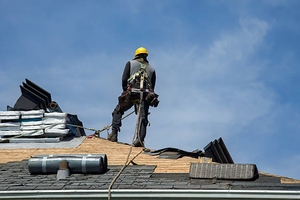 Professional Roofing technician working in Linwood, MA